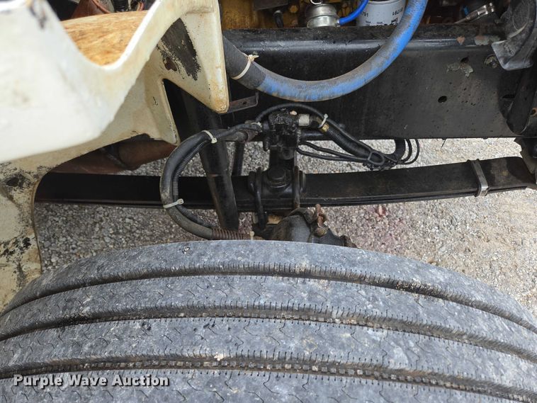 image for item ED2047 2000 Freightliner FL80 flatbed truck