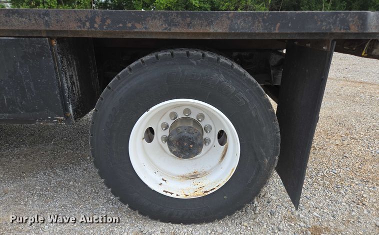 image for item ED2047 2000 Freightliner FL80 flatbed truck