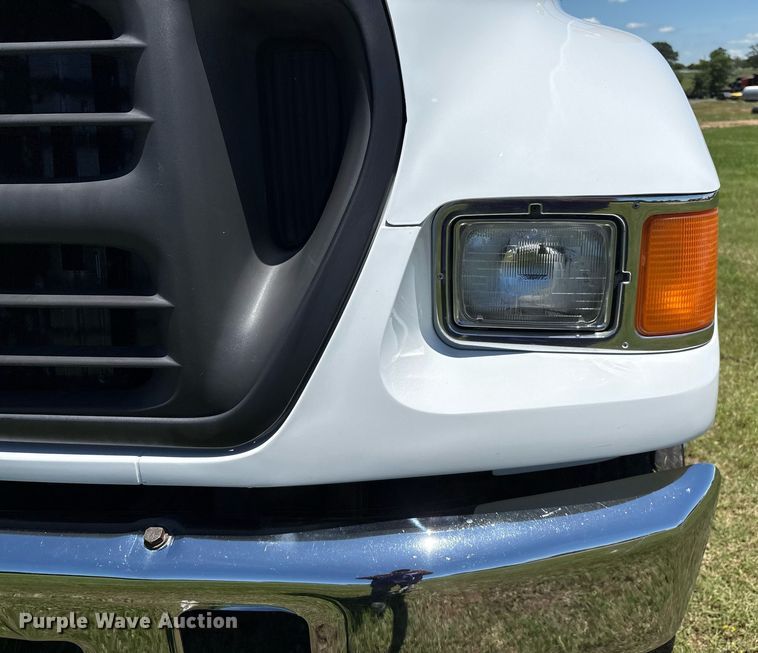 image for item EM2590 2003 Ford F750 flatbed truck