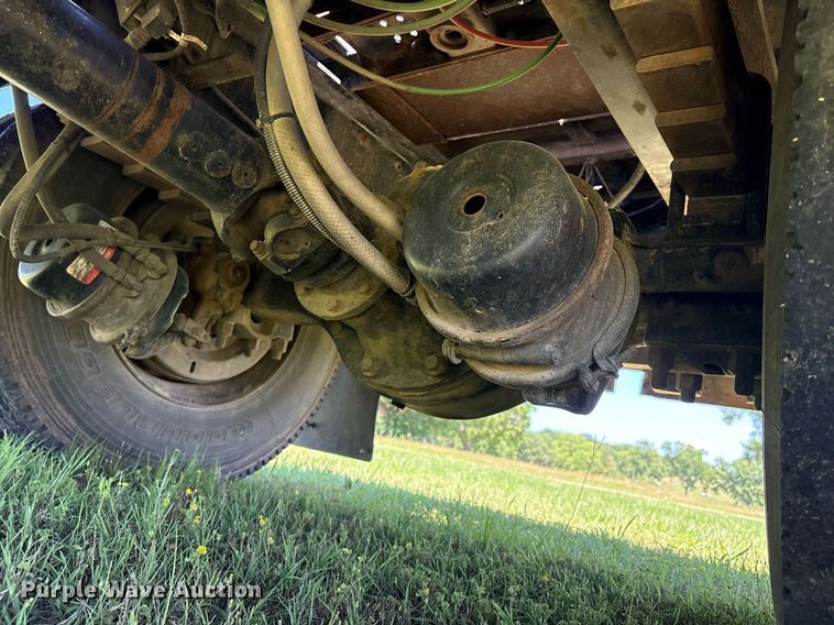 image for item EM2590 2003 Ford F750 flatbed truck