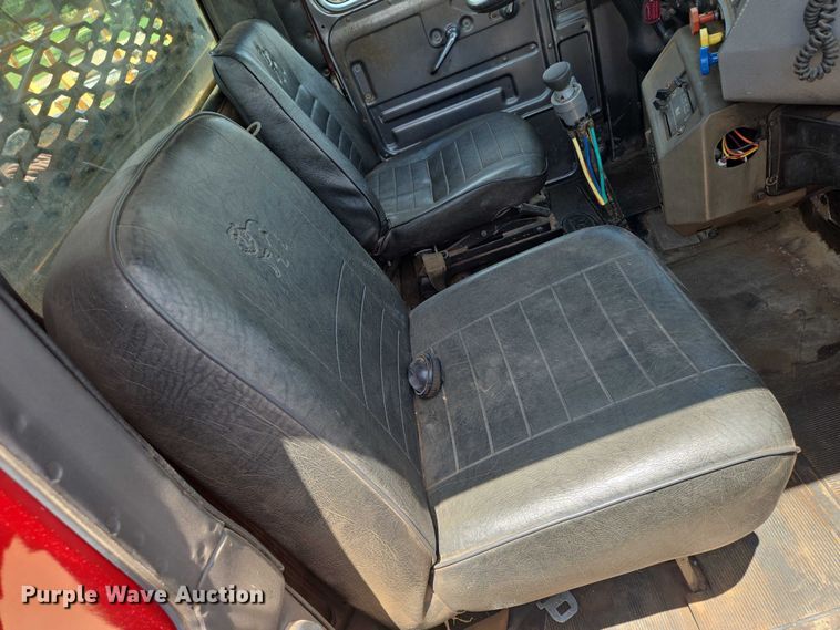 image for item EN8108 1991 Mack RD688S winch truck