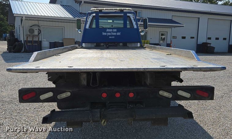 image for item ED2056 1995 GMC TopKick rollback truck