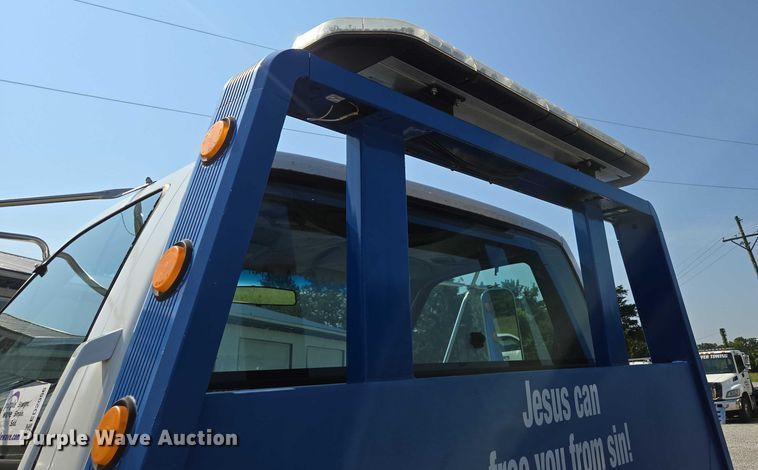 image for item ED2056 1995 GMC TopKick rollback truck