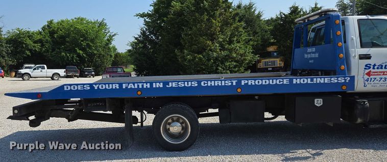 image for item ED2056 1995 GMC TopKick rollback truck