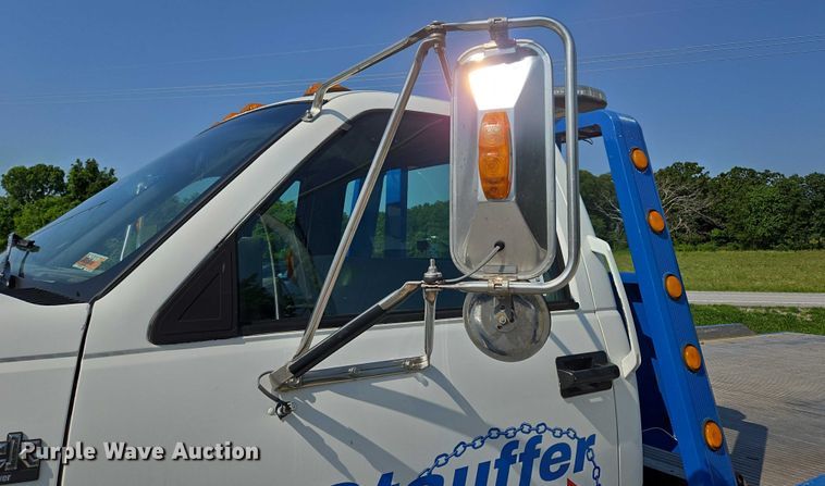 image for item ED2056 1995 GMC TopKick rollback truck