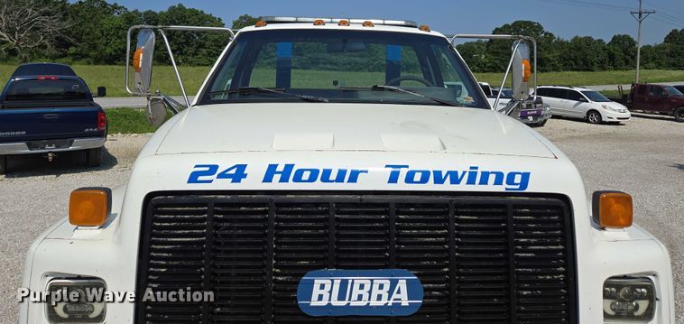 image for item ED2056 1995 GMC TopKick rollback truck