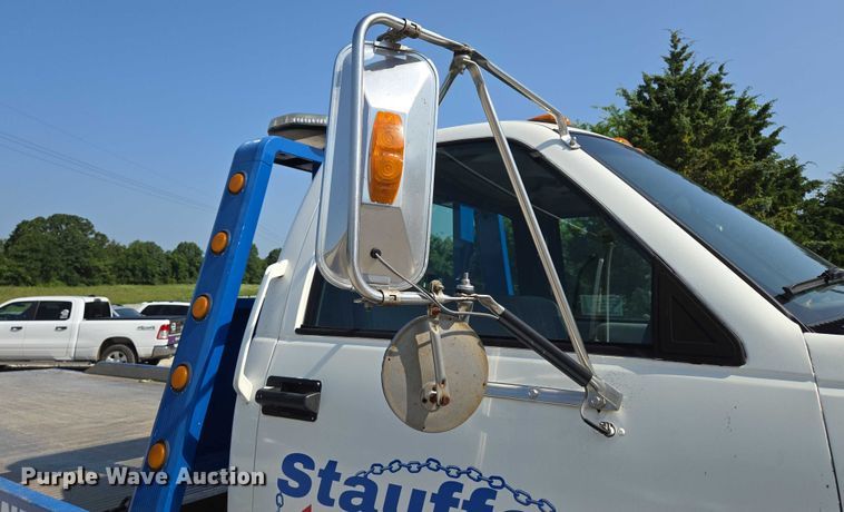 image for item ED2056 1995 GMC TopKick rollback truck