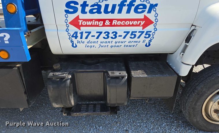 image for item ED2056 1995 GMC TopKick rollback truck