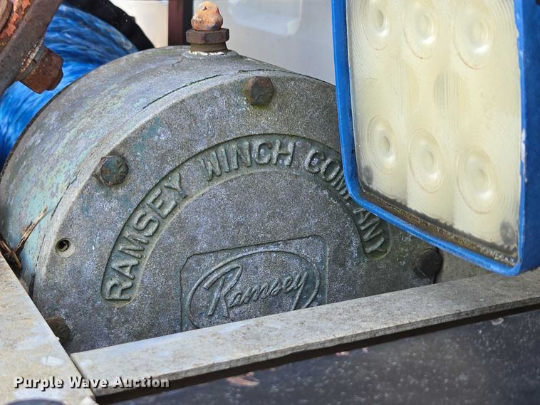 image for item ED2056 1995 GMC TopKick rollback truck