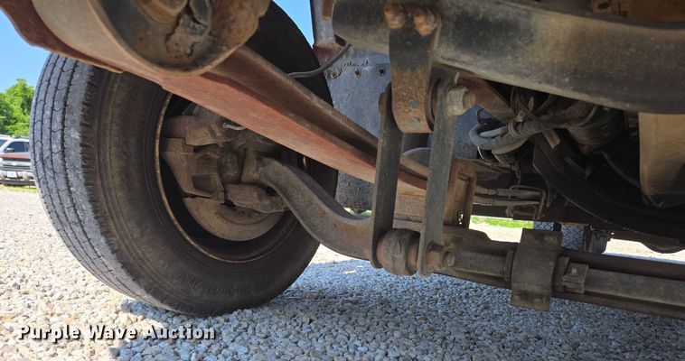 image for item ED2056 1995 GMC TopKick rollback truck