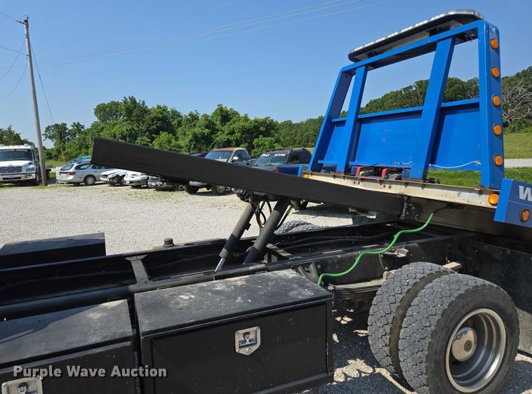 image for item ED2056 1995 GMC TopKick rollback truck