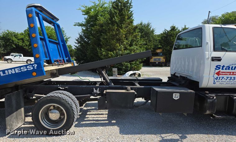 image for item ED2056 1995 GMC TopKick rollback truck