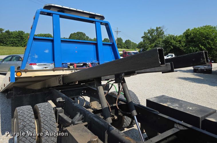 image for item ED2056 1995 GMC TopKick rollback truck