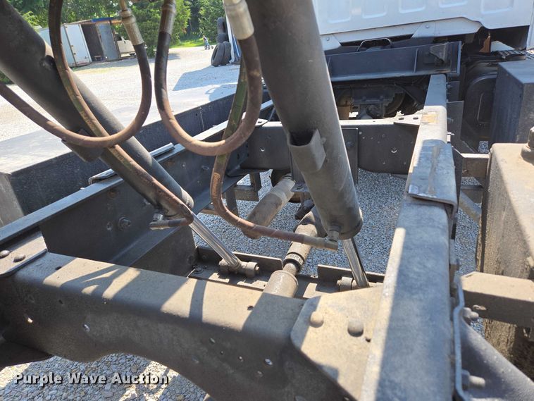 image for item ED2056 1995 GMC TopKick rollback truck