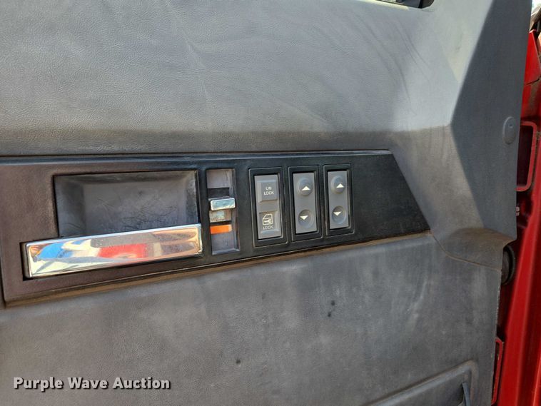 image for item ED2056 1995 GMC TopKick rollback truck