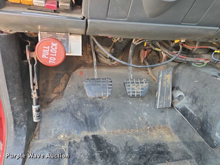 image for item ED2056 1995 GMC TopKick rollback truck