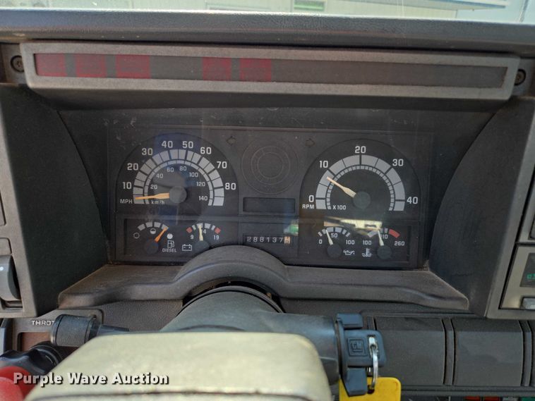 image for item ED2056 1995 GMC TopKick rollback truck