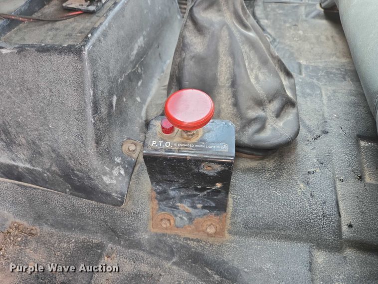 image for item ED2056 1995 GMC TopKick rollback truck