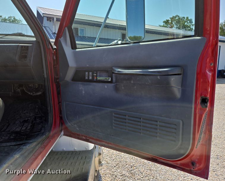 image for item ED2056 1995 GMC TopKick rollback truck