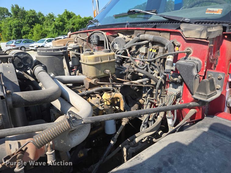 image for item ED2056 1995 GMC TopKick rollback truck