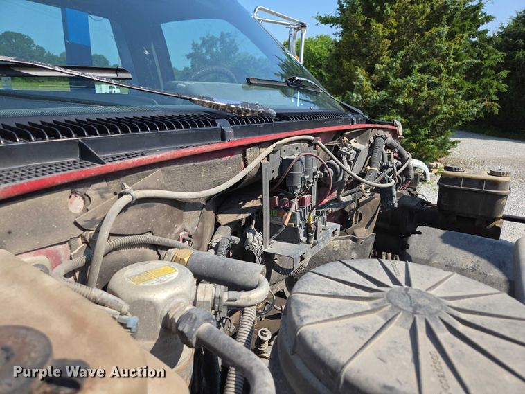 image for item ED2056 1995 GMC TopKick rollback truck