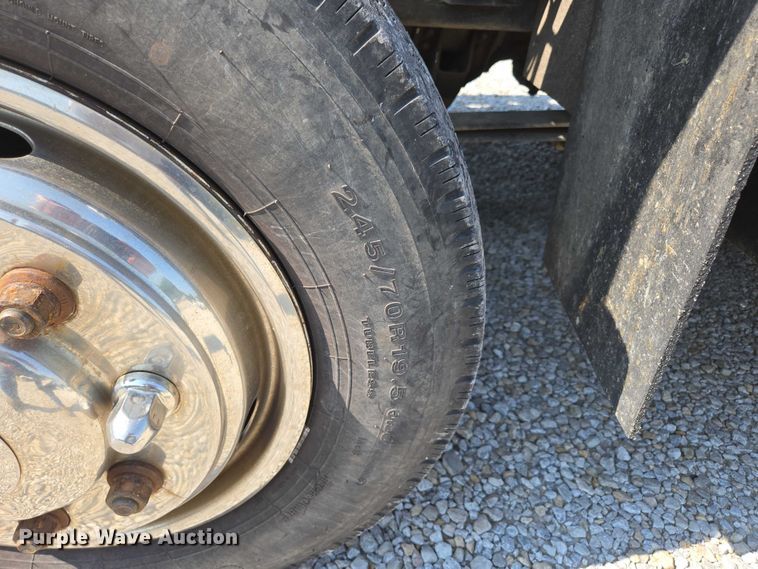 image for item ED2056 1995 GMC TopKick rollback truck