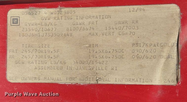 image for item ED2056 1995 GMC TopKick rollback truck