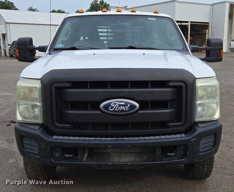 image for item ED2075 2011 Ford F350 Super Duty Crew Cab flatbed pickup truck
