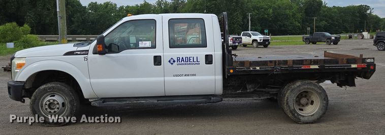 image for item ED2075 2011 Ford F350 Super Duty Crew Cab flatbed pickup truck