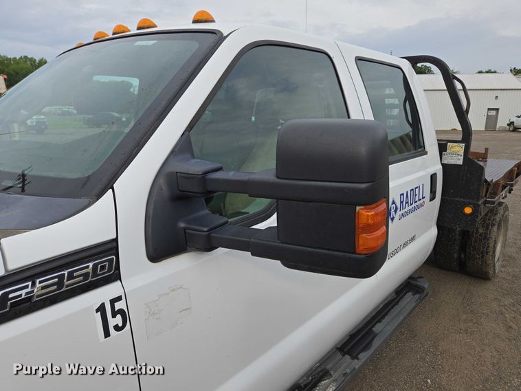 image for item ED2075 2011 Ford F350 Super Duty Crew Cab flatbed pickup truck