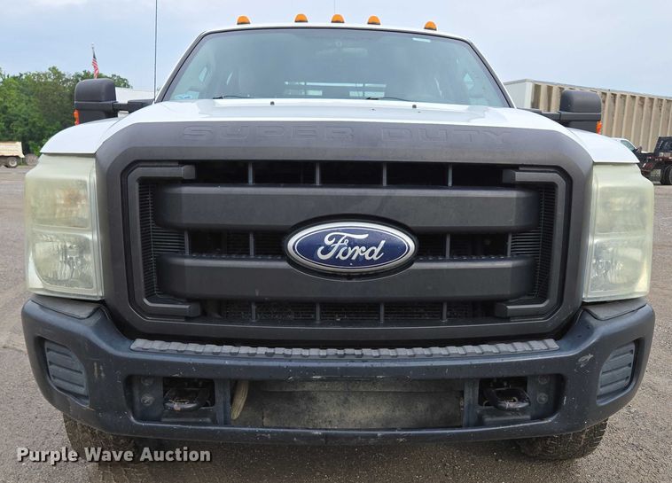 image for item ED2075 2011 Ford F350 Super Duty Crew Cab flatbed pickup truck