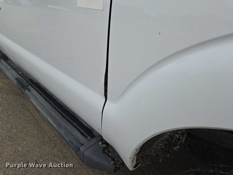 image for item ED2075 2011 Ford F350 Super Duty Crew Cab flatbed pickup truck