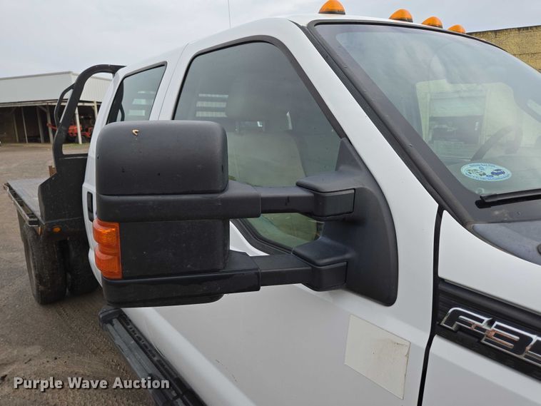 image for item ED2075 2011 Ford F350 Super Duty Crew Cab flatbed pickup truck