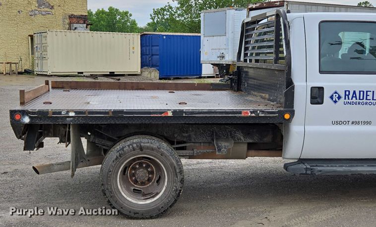 image for item ED2075 2011 Ford F350 Super Duty Crew Cab flatbed pickup truck