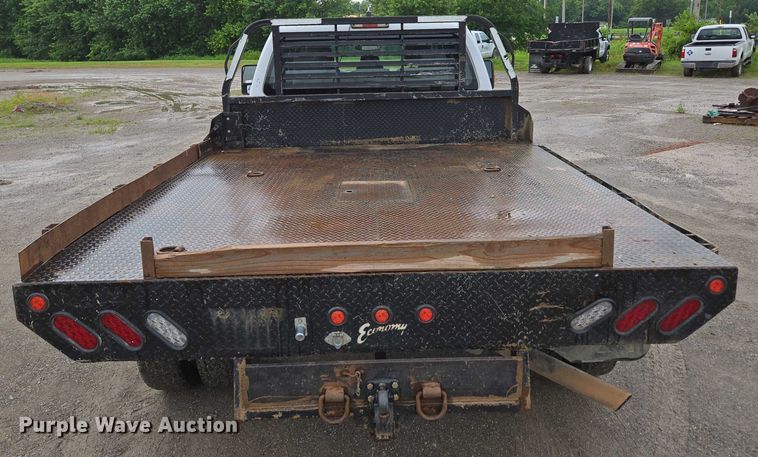 image for item ED2075 2011 Ford F350 Super Duty Crew Cab flatbed pickup truck