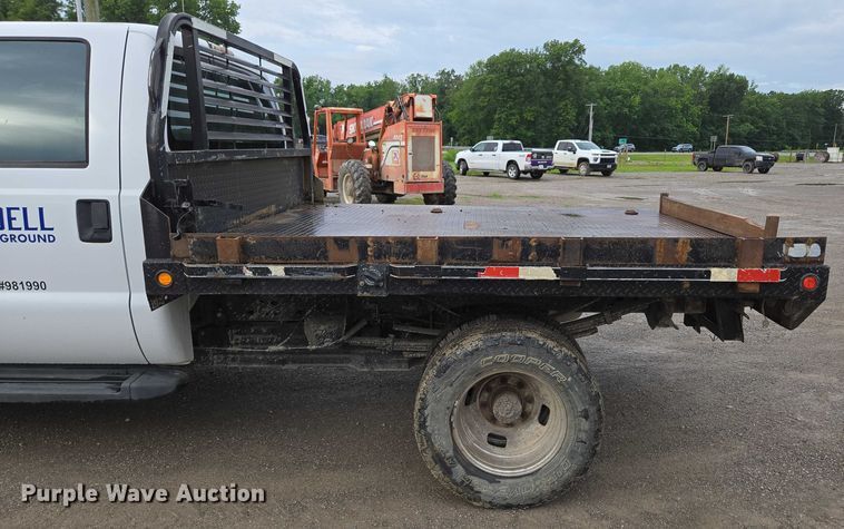 image for item ED2075 2011 Ford F350 Super Duty Crew Cab flatbed pickup truck