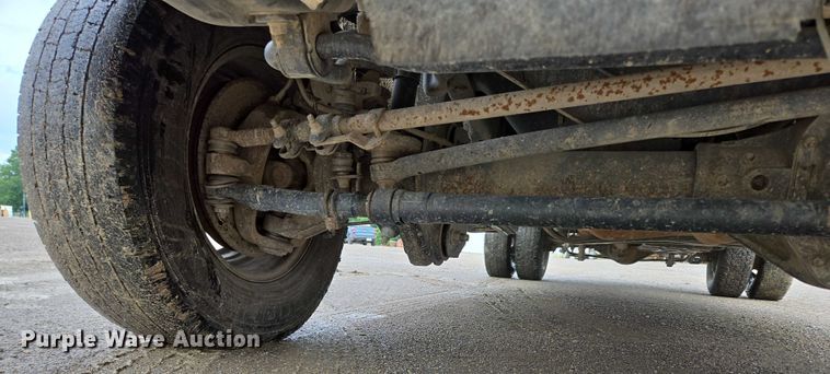 image for item ED2075 2011 Ford F350 Super Duty Crew Cab flatbed pickup truck