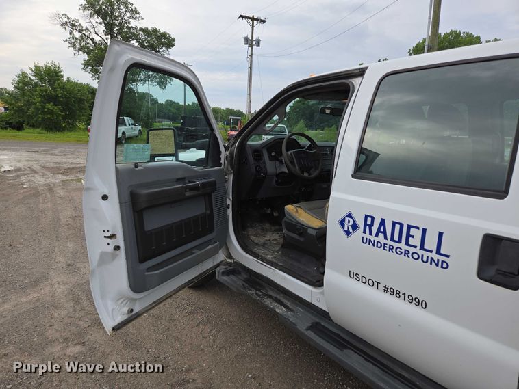 image for item ED2075 2011 Ford F350 Super Duty Crew Cab flatbed pickup truck