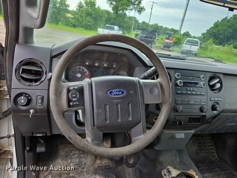 image for item ED2075 2011 Ford F350 Super Duty Crew Cab flatbed pickup truck