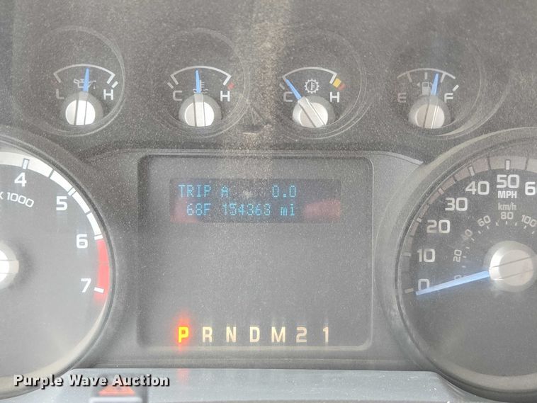 image for item ED2075 2011 Ford F350 Super Duty Crew Cab flatbed pickup truck