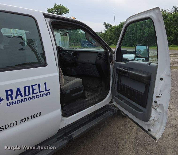 image for item ED2075 2011 Ford F350 Super Duty Crew Cab flatbed pickup truck