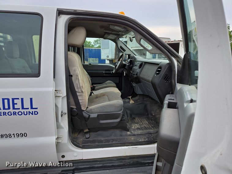 image for item ED2075 2011 Ford F350 Super Duty Crew Cab flatbed pickup truck