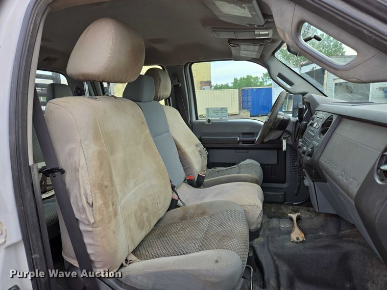 image for item ED2075 2011 Ford F350 Super Duty Crew Cab flatbed pickup truck