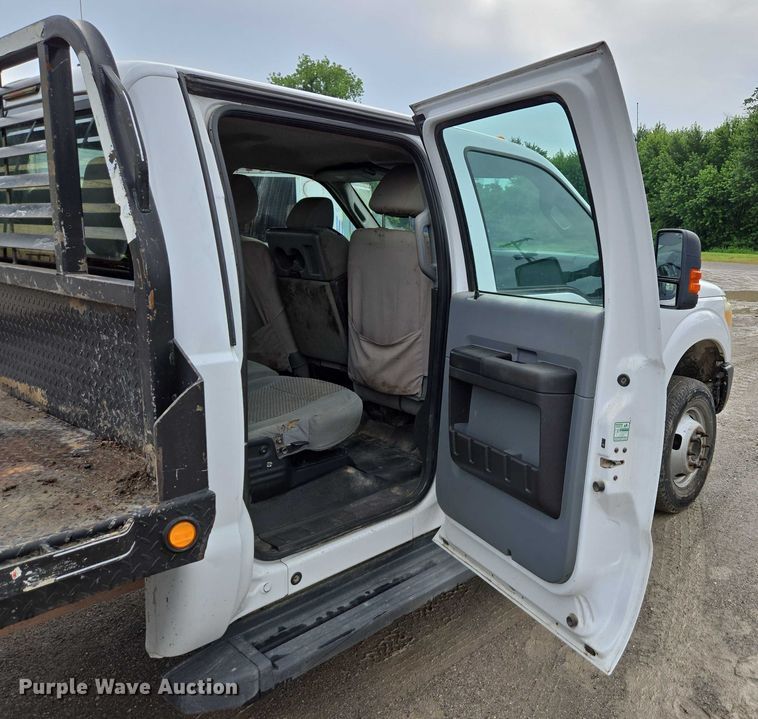 image for item ED2075 2011 Ford F350 Super Duty Crew Cab flatbed pickup truck