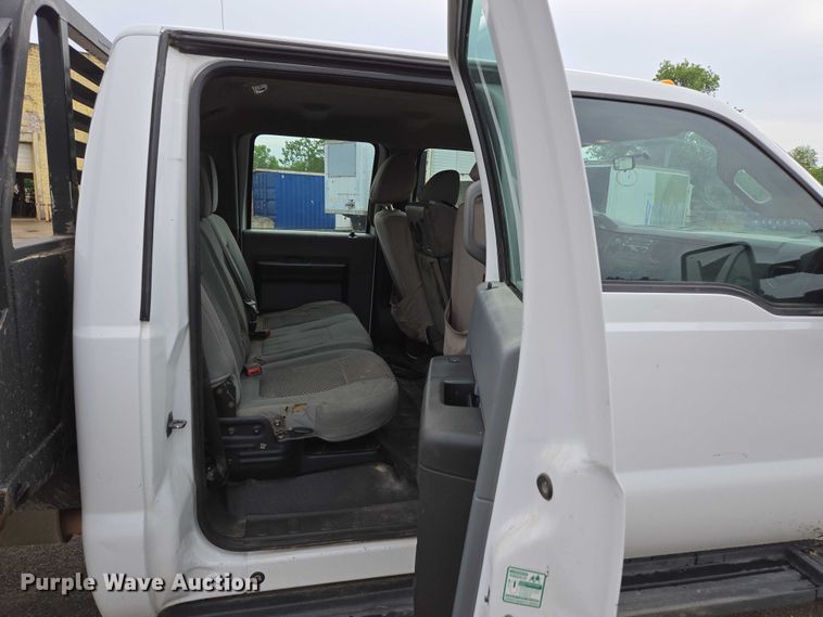 image for item ED2075 2011 Ford F350 Super Duty Crew Cab flatbed pickup truck