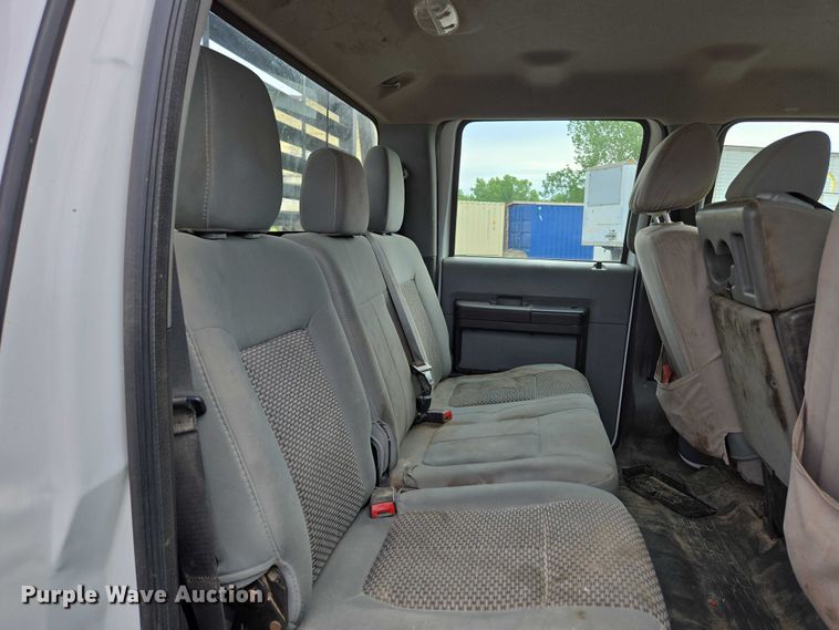 image for item ED2075 2011 Ford F350 Super Duty Crew Cab flatbed pickup truck