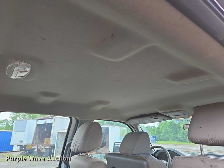 image for item ED2075 2011 Ford F350 Super Duty Crew Cab flatbed pickup truck