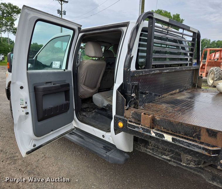 image for item ED2075 2011 Ford F350 Super Duty Crew Cab flatbed pickup truck