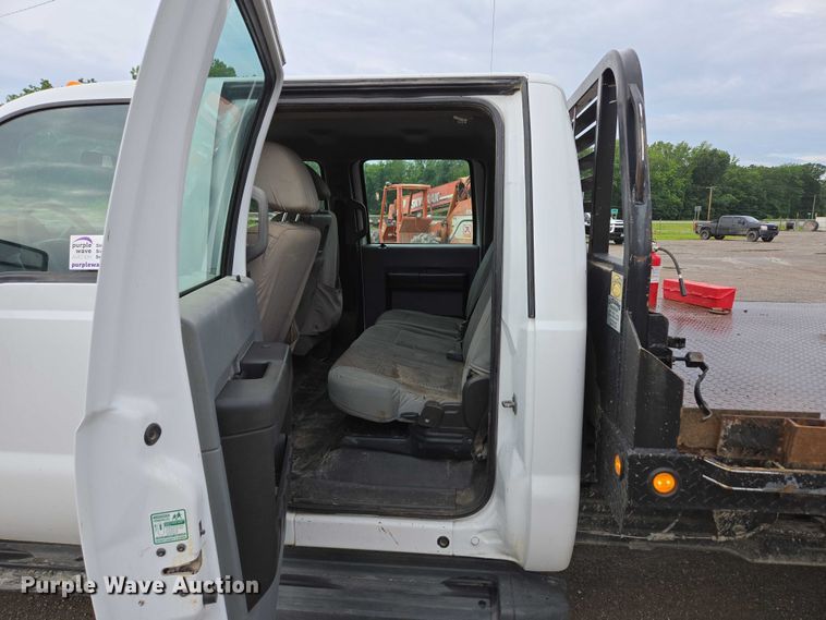 image for item ED2075 2011 Ford F350 Super Duty Crew Cab flatbed pickup truck