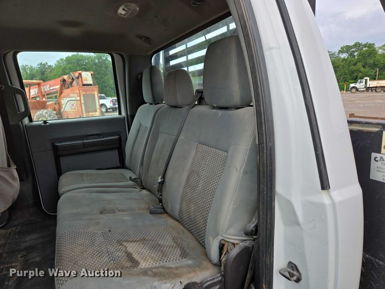 image for item ED2075 2011 Ford F350 Super Duty Crew Cab flatbed pickup truck